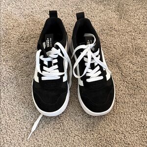Vans women’s Classic Black and White Sneakers